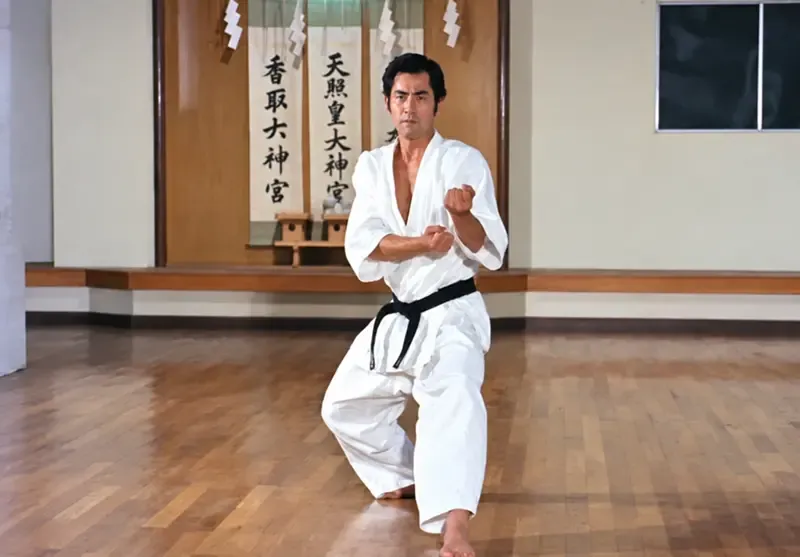 Master Tomoji Miyamoto performing kata before the Kamidana in the 1970s film